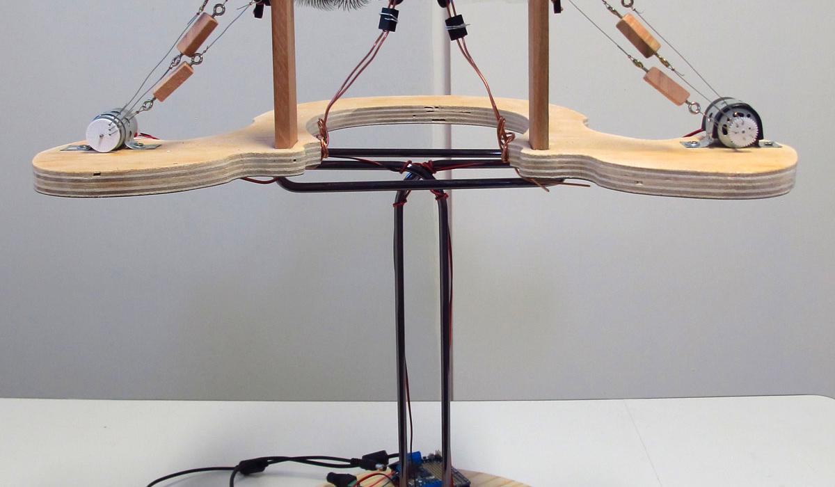 Lessner, L. (2019). Beijos de Borboleta. Interactive sculpture: carnaval eyelashes, wood, metal, PLA, motors, microcontroller. 22 x 19.5 x 13 in. Lessner, L. (2019). Beijos de Borboleta. Interactive sculpture: carnaval eyelashes, wood, metal, PLA, motors, microcontroller. 22 x 19.5 x 13 in.